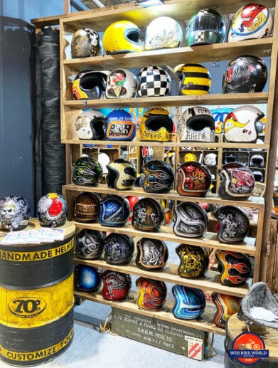 A collection of custom helmets from EICMA 2019 displays.