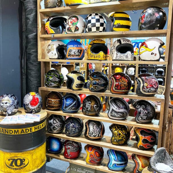 A collection of custom helmets from EICMA 2019 displays.