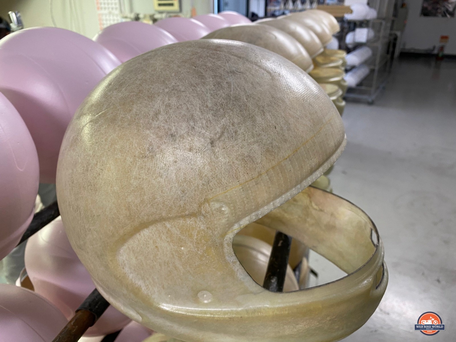 Unpainted helmet shells at the Arai factory.