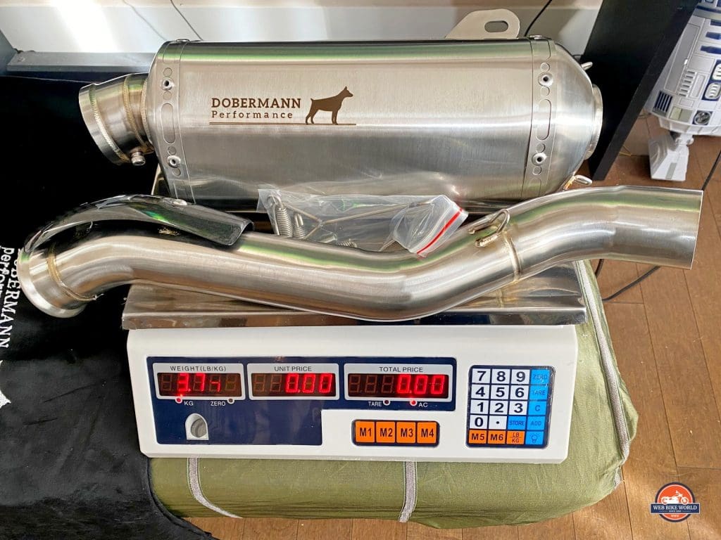 The Dobermann Performance exhaust for a 790 Adventure on a scale