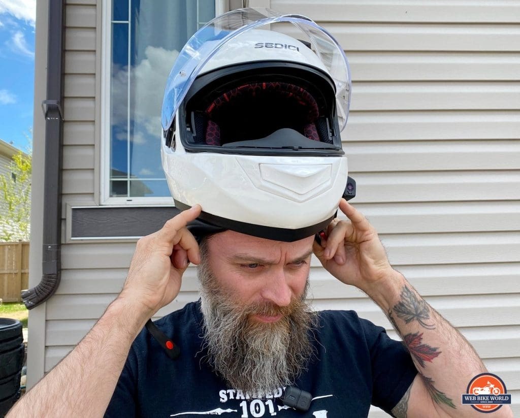 Donning the Sedici Strada II helmet.