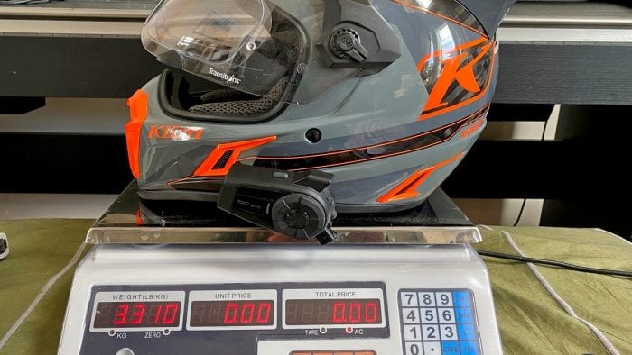 The Klim Krios Pro with a Sena 10 EVO installed on it being weighed. The Klim Krios Pro with a Sena 10 EVO installed on it being weighed.