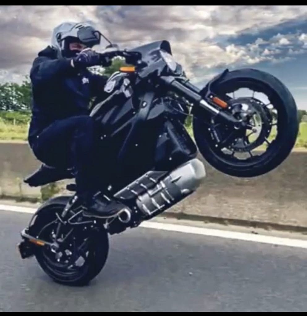 A rider doing a wheelie with the LiveWire