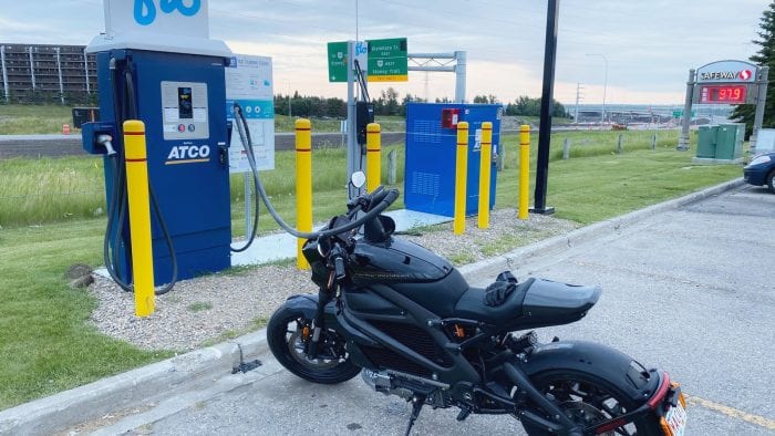 The Harley Davidson LiveWire charging at a fast charge station. The Harley Davidson LiveWire charging at a fast charge station.