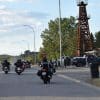 The Twin Cities Saloon in Longview, Alberta with motorcycles riding up to park in the lot.