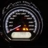 A Harley odometer reading just under 1000 kilometers.