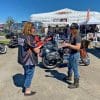 People enjoying the festivities of the Rally in the Rockies held at Calgary Harley Davidson.