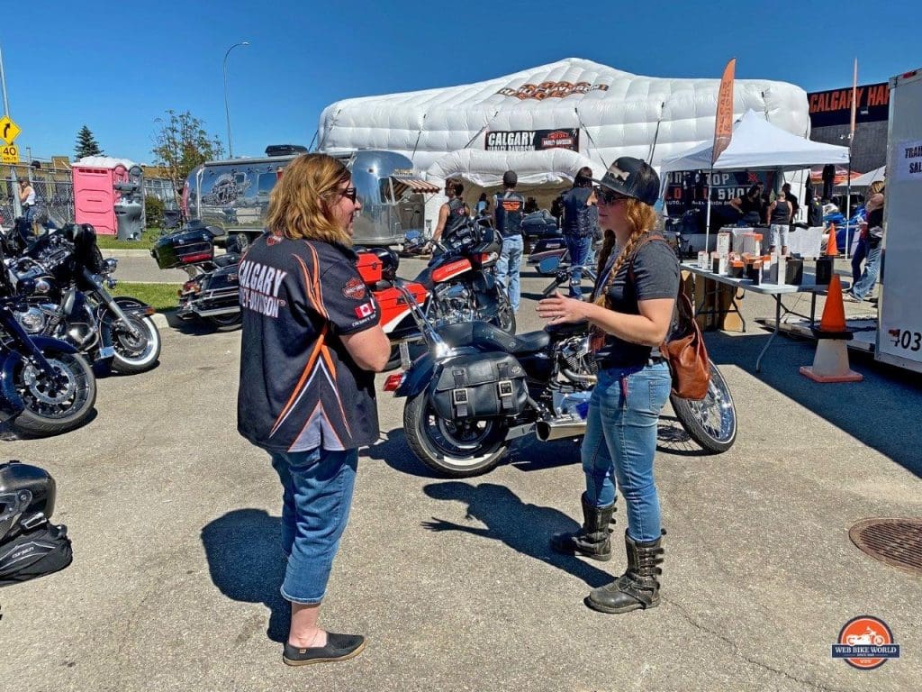 People enjoying the festivities of the Rally in the Rockies held at Calgary Harley Davidson.