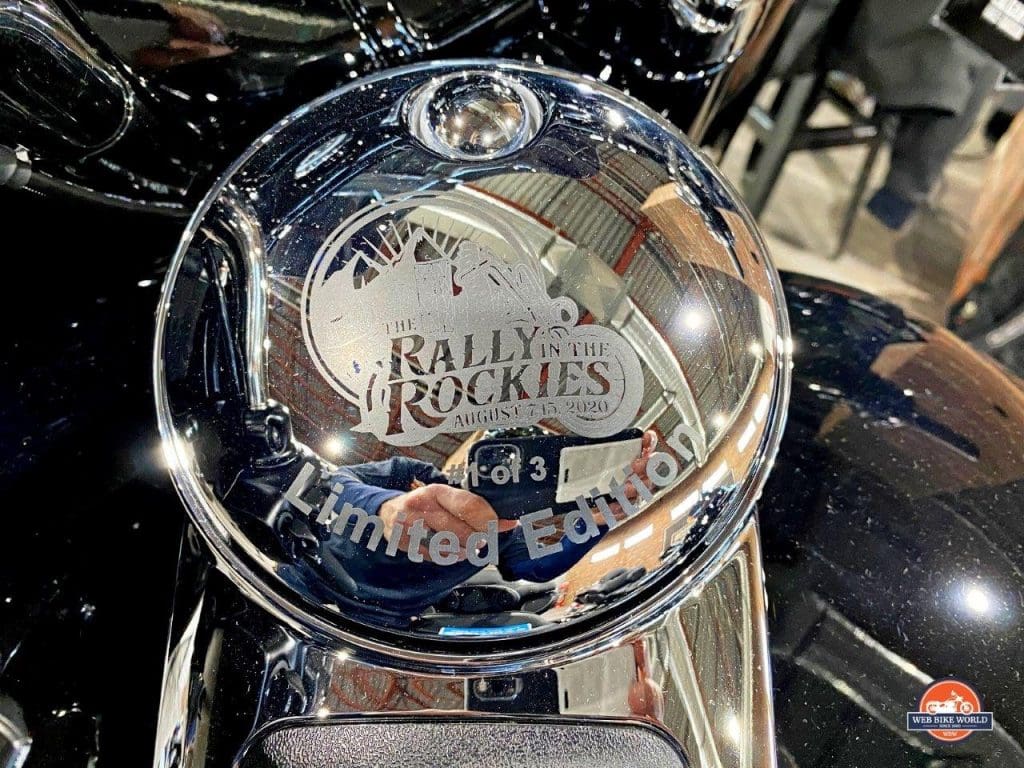 A limited edition Rally in the Rockies fuel tank cover on a Harley Davidson motorcycle.