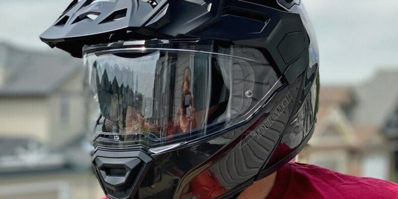 Touratech Aventuro Traveller Carbon helmet with closed visor.