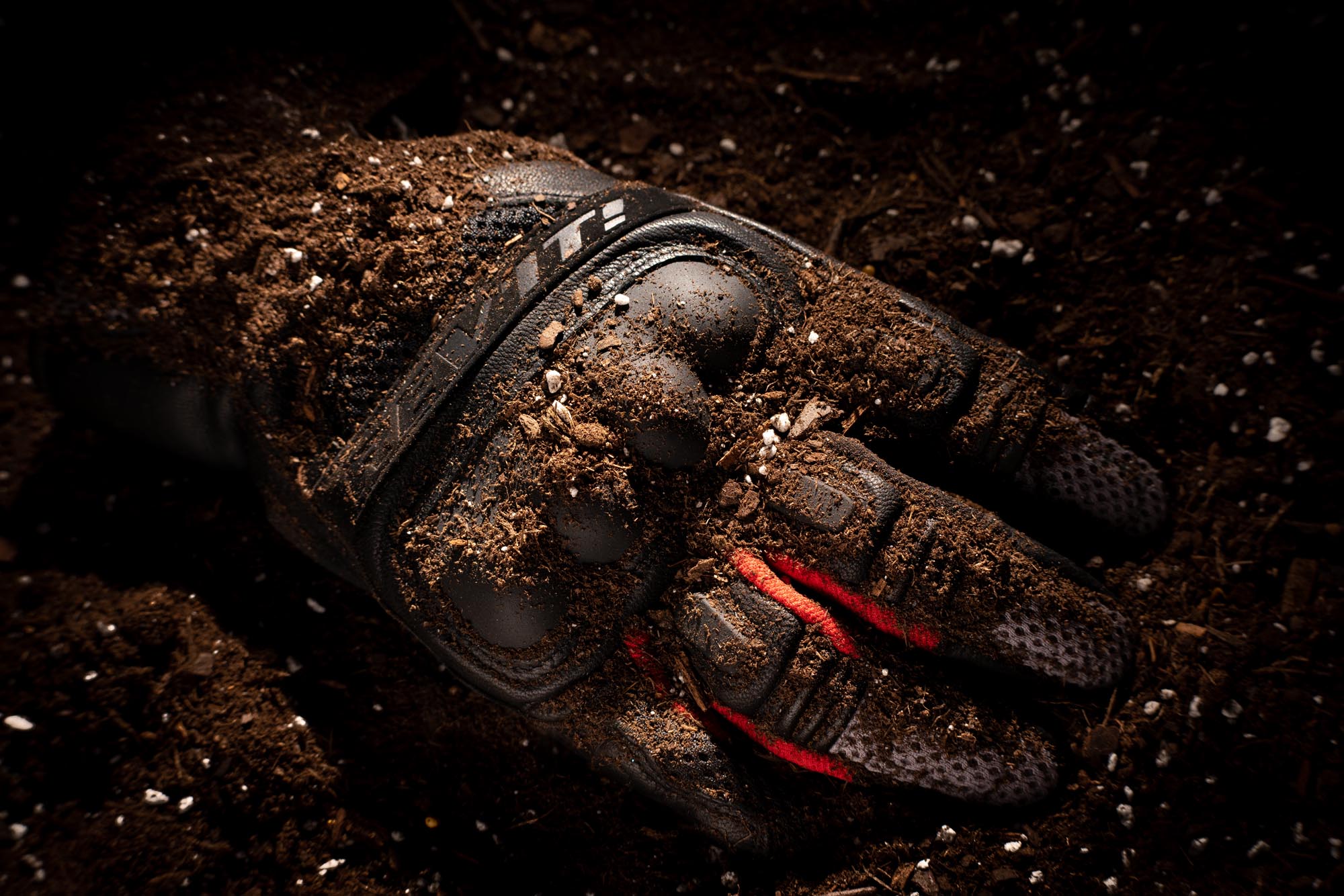 REV'IT Dirt 3 gloves covered in dirt