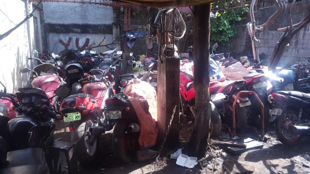 abandoned bikes sitting in a lot