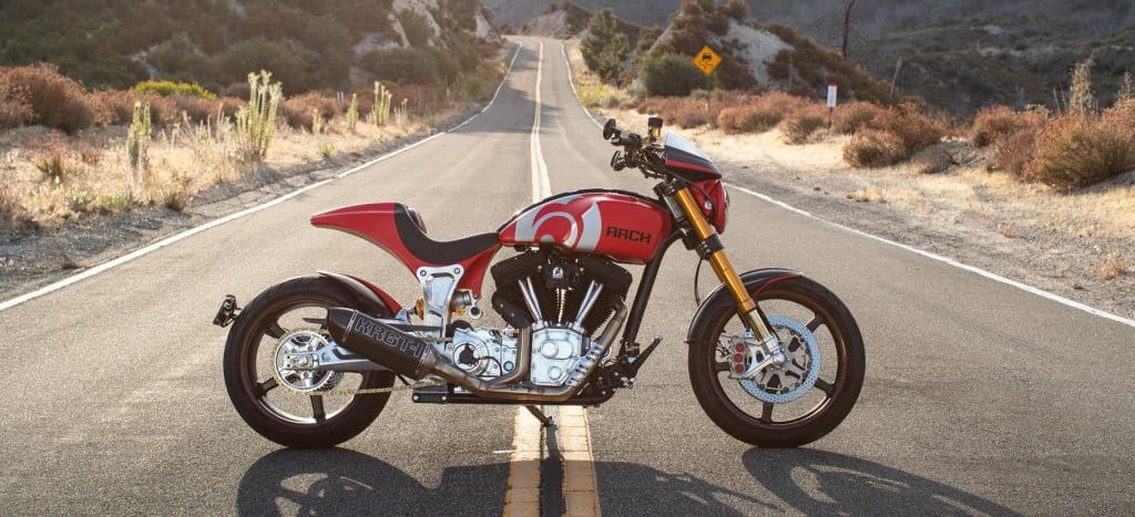 Red ARCH KRGT-1 parked in middle of the road