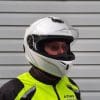 Rider wearing Sena Outrush Modular Helmet