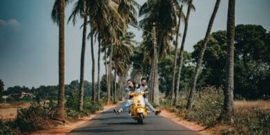 couple riding a scooter