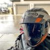 The Arai XD-4 with beading water on it after riding in the rain.