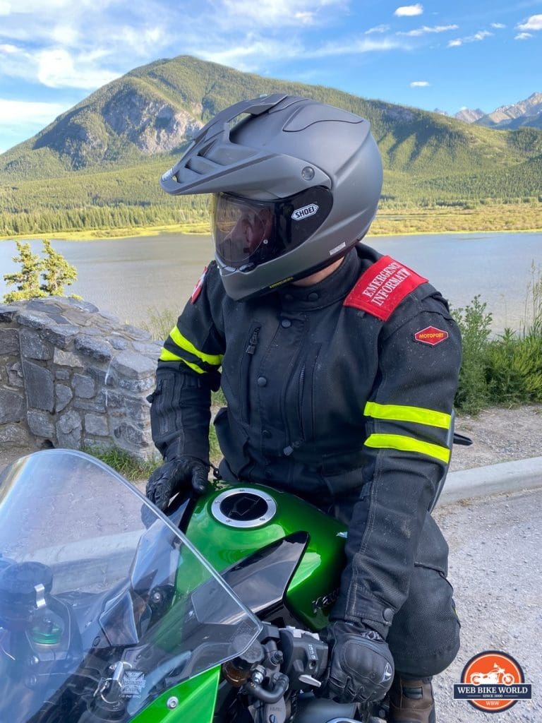 The Shoei Hornet X2 being worn while riding a Kawasaki Ninja H2SX SE.