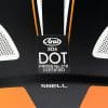 The Snell and DOT stickers on the back of the Arai XD-4 helmet.