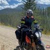 Jim Pruner riding a KTM 790 Adventure while wearing the Arai XD-4 helmet.