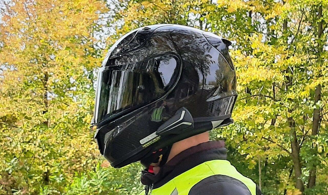 Side view of rider wearing RPHA 11 Pro Carbon helmet