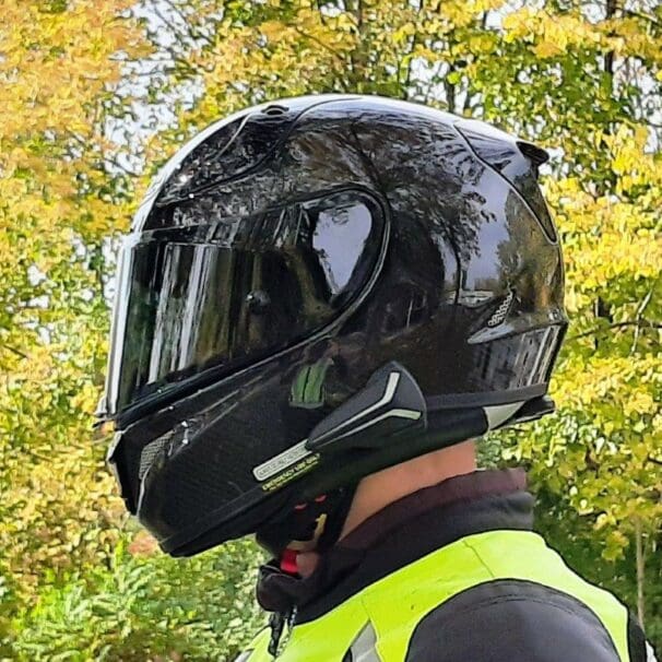 Side view of rider wearing RPHA 11 Pro Carbon helmet