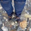The Joe Rocket Canada Whistler Adventure boots submerged in a stream.