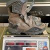 The Joe Rocket Canada Whistler Adventure boots weighing 3.3lbs on a scale.