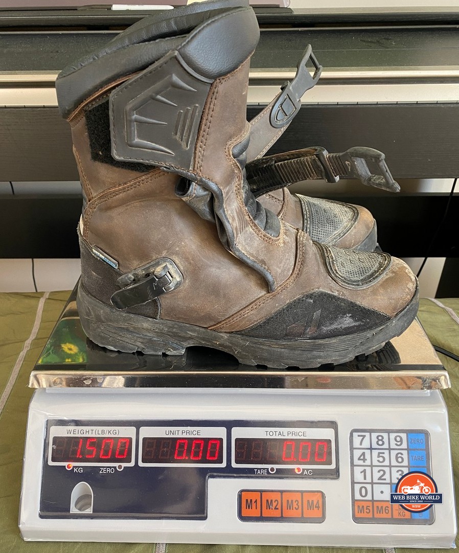 The Joe Rocket Canada Whistler Adventure boots weighing 3.3lbs on a scale.