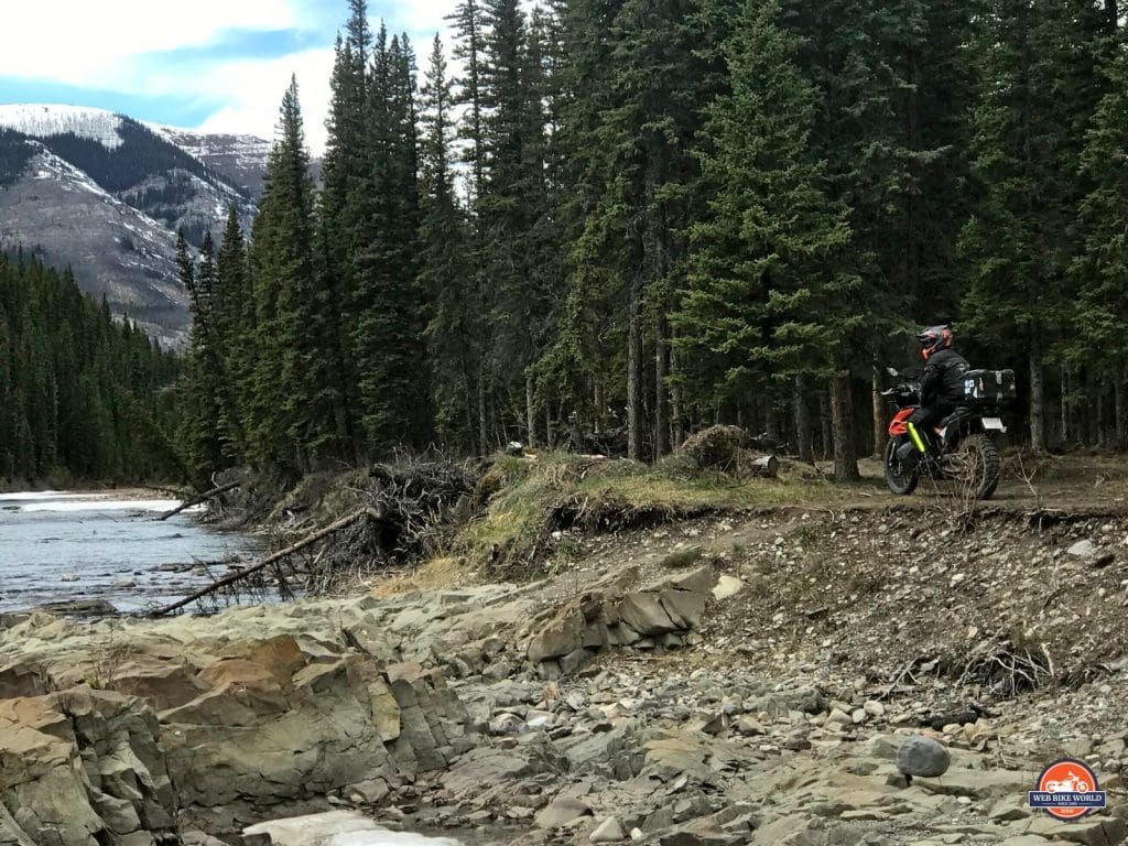 Jim Pruner on his KTM 790 Adventure riding off road near Yaha Tinda Ranch, Alberta.