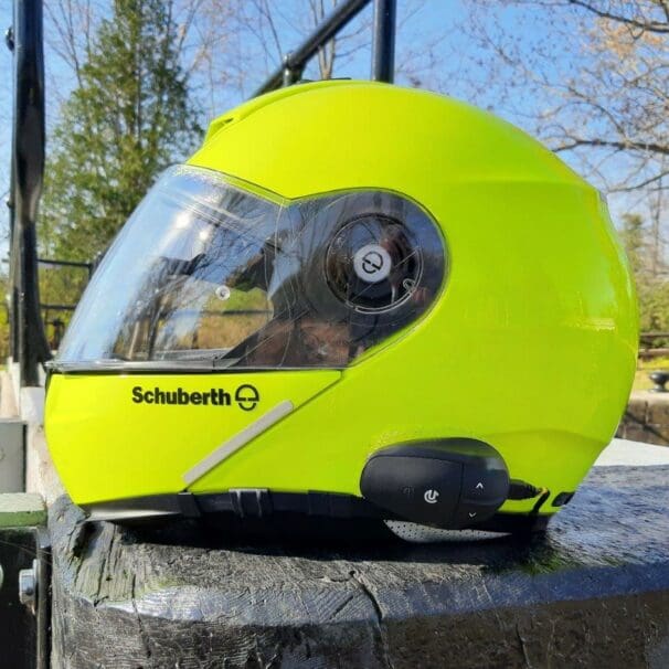 UClear AMPGo2 mounted on side of Schuberth C3 Pro helmet