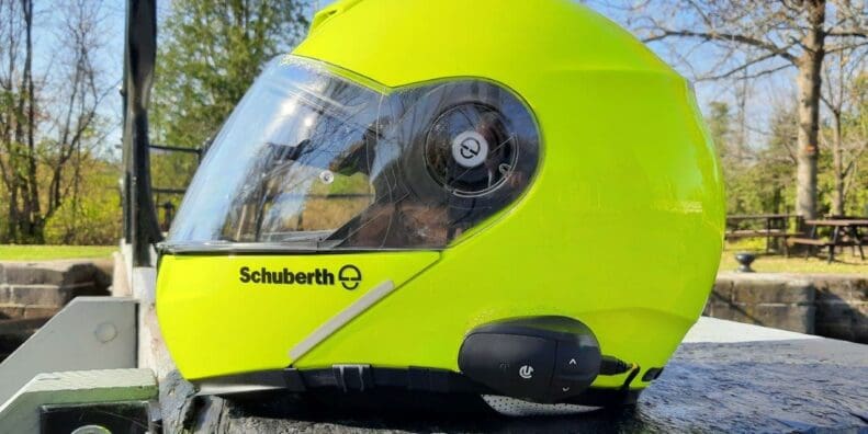 UClear AMPGo2 mounted on side of Schuberth C3 Pro helmet