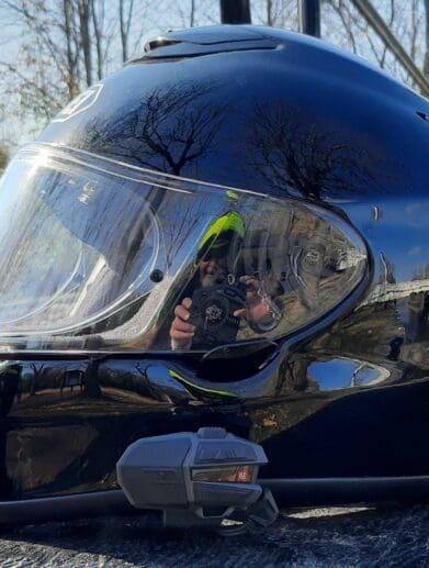 Side shot of UClear Motion 4 Life mounted on Shoei QWEST helmet