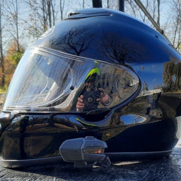Side shot of UClear Motion 4 Life mounted on Shoei QWEST helmet