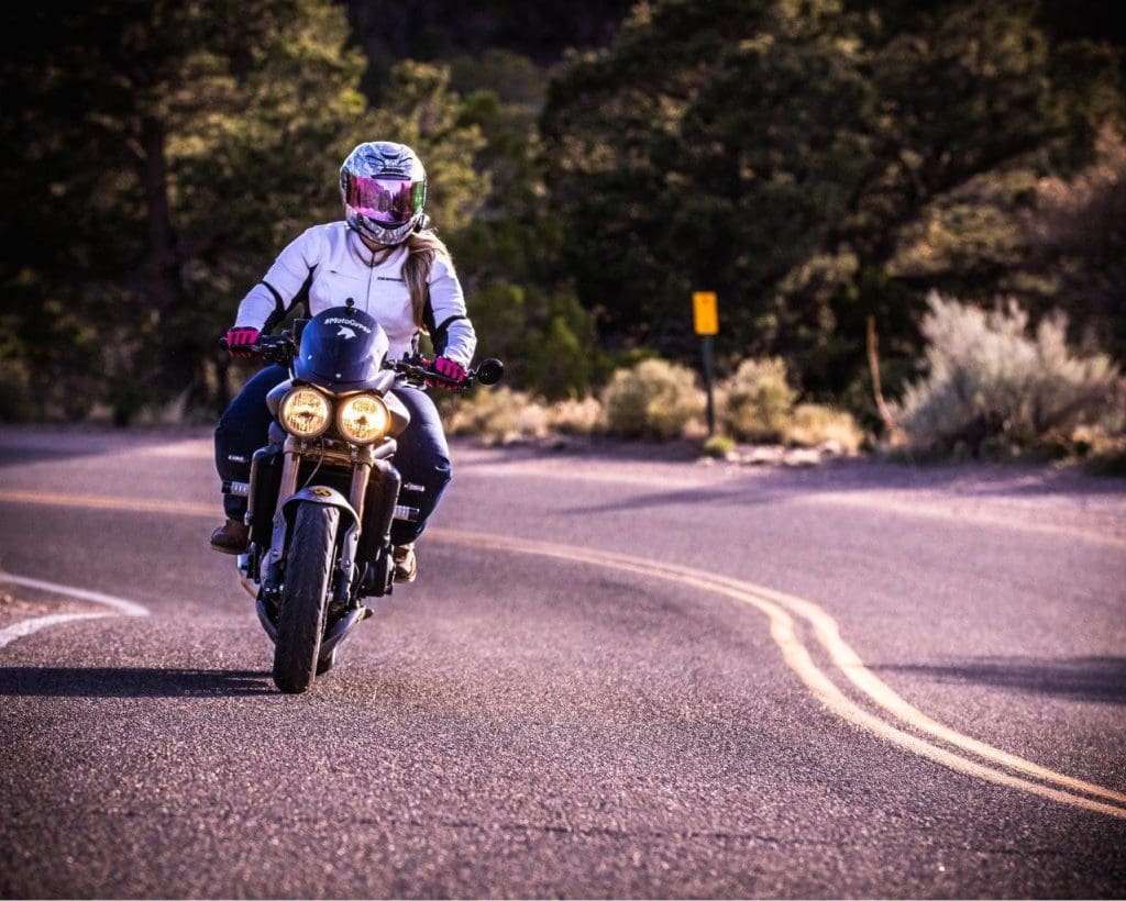 Rider Brittany Morrow riding motorcycle on the road