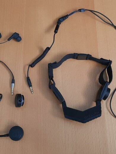 iASUS Stealth Throat microphone laid out on table