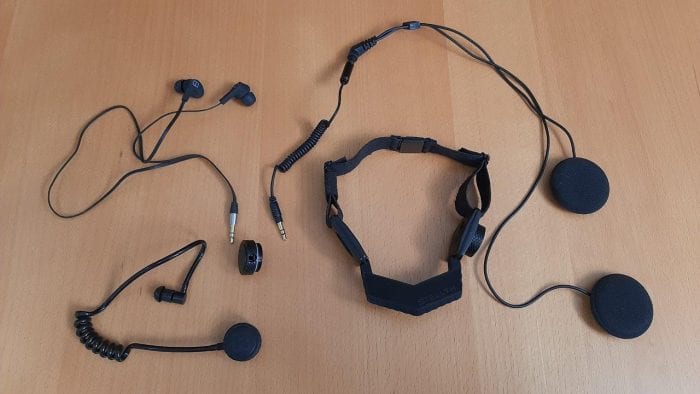 iASUS Stealth Throat microphone laid out on table iASUS Stealth Throat microphone laid out on table