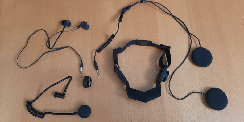 iASUS Stealth Throat microphone laid out on table