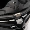 Location of where the visor clips locks the visor in closed position