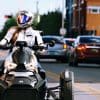 Rider on Can-Am Ryker 900 Rally Edition in city streets