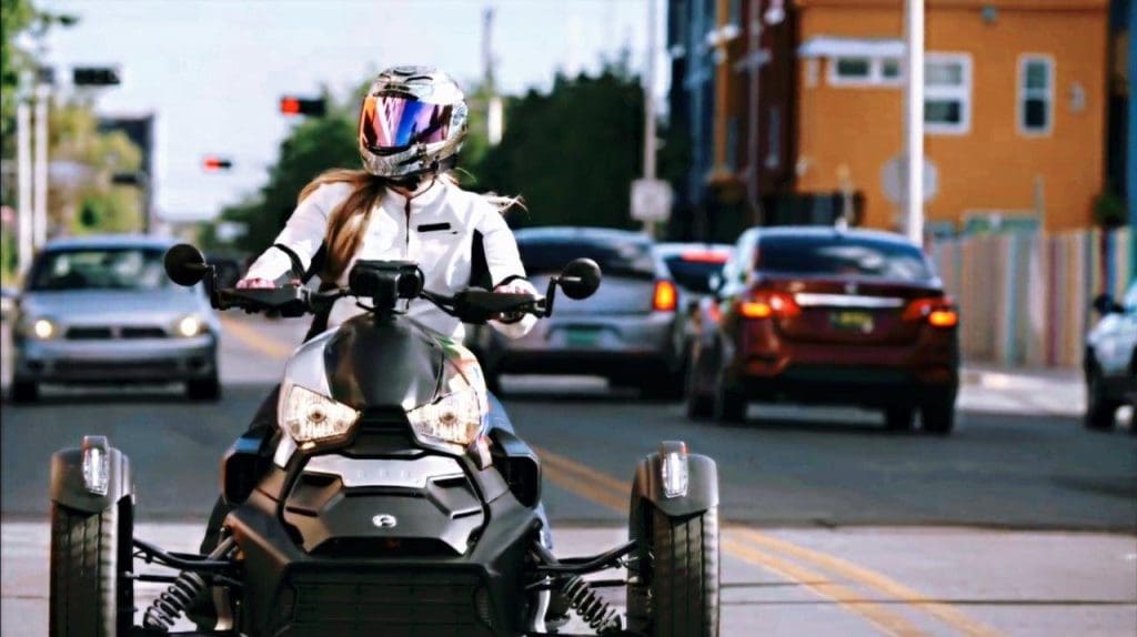 Rider on Can-Am Ryker 900 Rally Edition in city streets