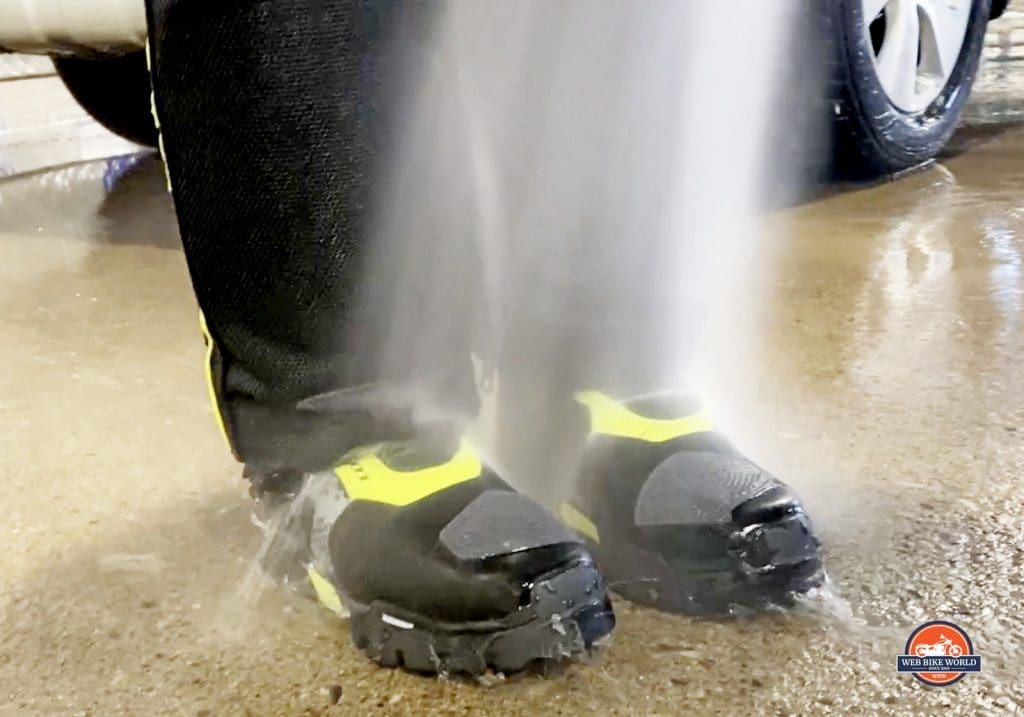 Using a pressure washer to simulate riding in the rain on my Klim Adventure GTX boots.