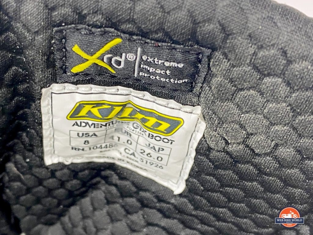 The velcro shin flap open on the Klim Adventure GTX boots.