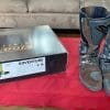 A photo of my trusty old Sidi Adventure 2 Gore-Tex boots beside the box holding my brand new Klim Adventure GTX boots.