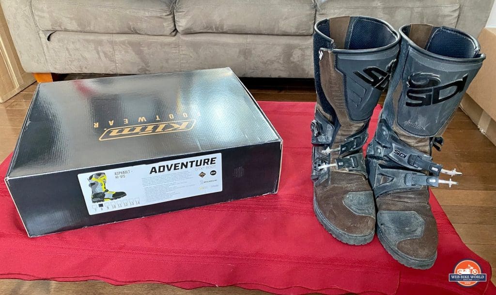 A photo of my trusty old Sidi Adventure 2 Gore-Tex boots beside the box holding my brand new Klim Adventure GTX boots.