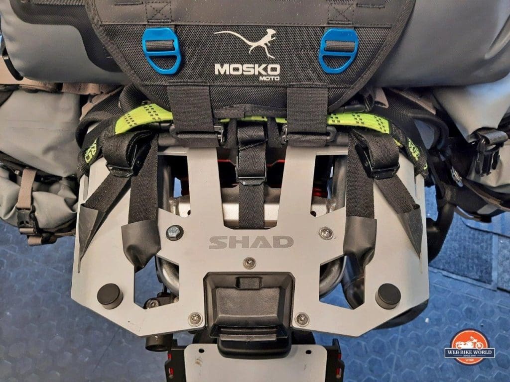 The Mosko Moto Reckless 80L v3.0 Revolver luggage strapped to a Shad cargo rack on a BMW F850GS Adventure motorcycle.