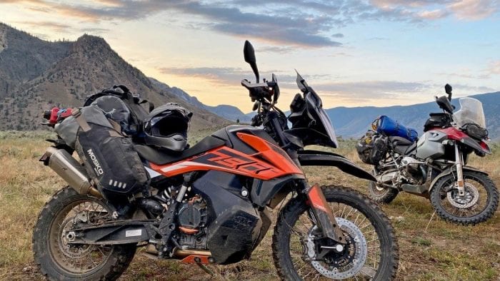 The Mosko Moto Reckless 80L V3.0 on a KTM 790 Adventure with a BMW R1200GS in the background. The Mosko Moto Reckless 80L V3.0 on a KTM 790 Adventure with a BMW R1200GS in the background.