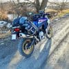 A 2020 BMW F850GS Adventure parked on a country road with the Mosko Moto Reckless 80L v3.0 Revolver luggage installed.