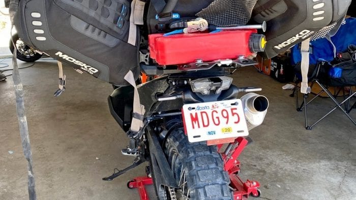 The Mosko Moto Reckless 80L V3.0 Revolver half removed from a KTM 790 adventure to access under the seat. The Mosko Moto Reckless 80L V3.0 Revolver half removed from a KTM 790 adventure to access under the seat.