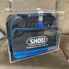 Mystery Shoei helment encased in a locked plexiglass box.