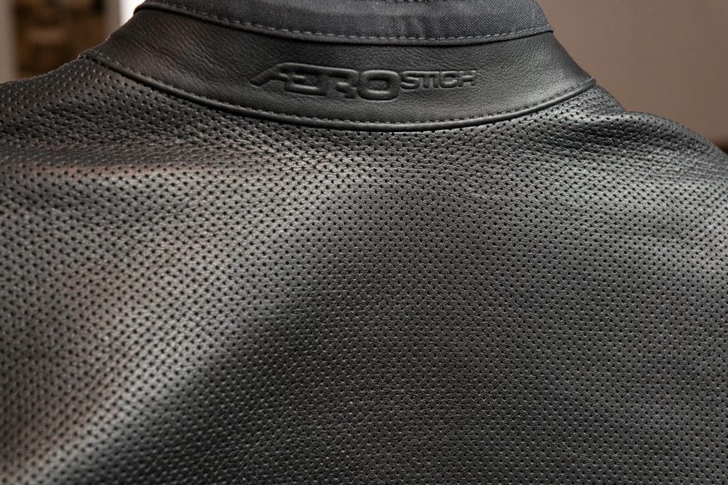 Rear closeup view of leather perforations on the Transit 3.0 suit